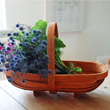 Small tradtional wooden Norfolk garden trug filled with cut flowers