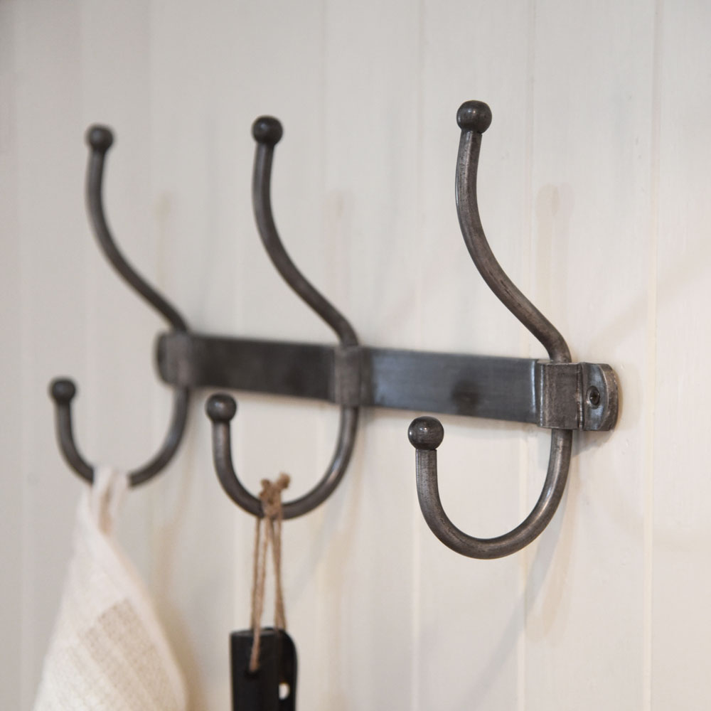 Row of industrial style galvanised coat hooks – Bowley Jackson