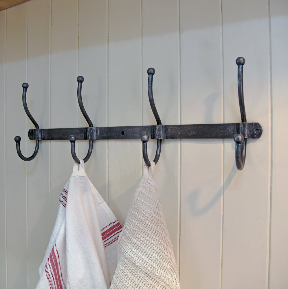 Row of industrial style galvanised coat hooks – Bowley Jackson