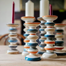 Collection of striped ceramic candle holders