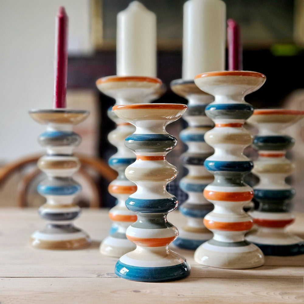 Collection of striped ceramic candle holders