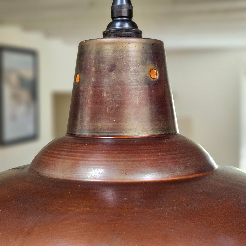 Close up of antique copper 360 mm pendant light with antique iron bulb holder and fabric covered flex