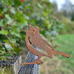 Blue tit bird garden art on a fence