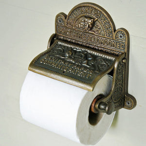 Antique wall mounted toilet roll holder
