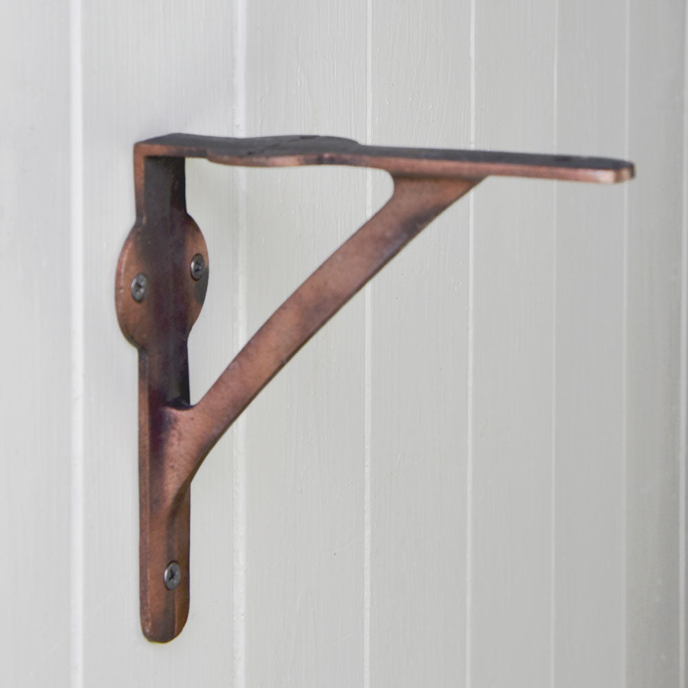 Copper shelf bracket