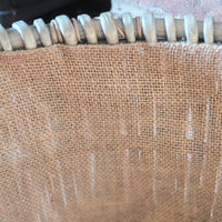 Close up of Cotswold basket hessian lining.