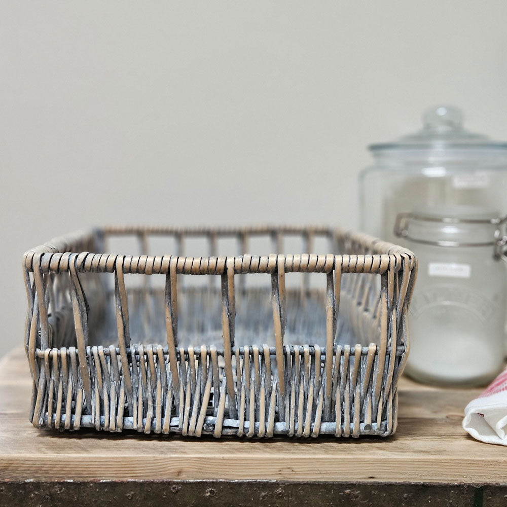 Scandinavian style storage basket on a shelving unit