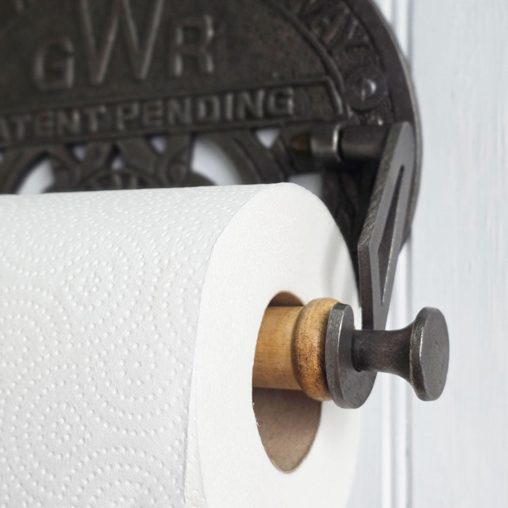 Vintage-style paper towel holder with 'GWR' branding on a white background