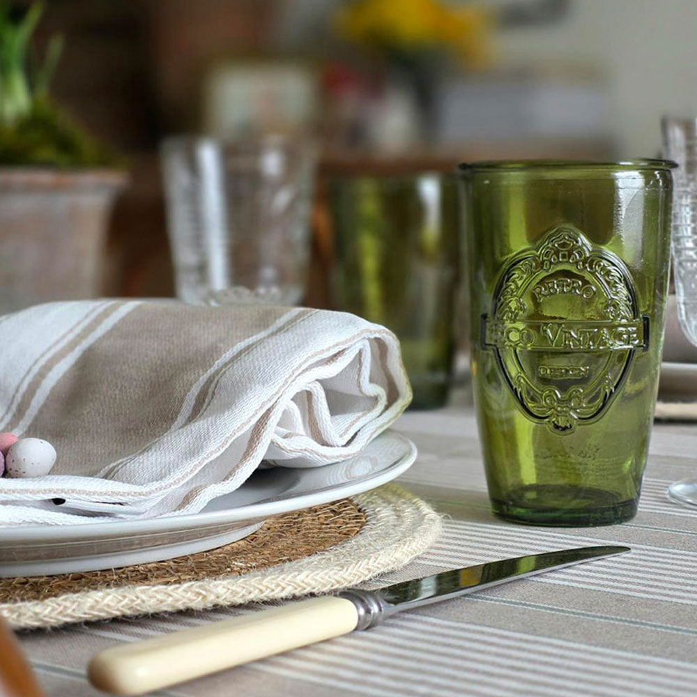 Green harbour striped wipe clean tablecloth on an Easter table