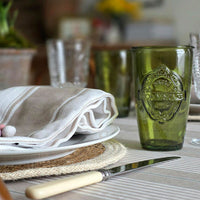 Green harbour striped wipe clean tablecloth on an Easter table