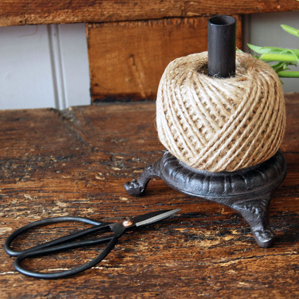 Cast iron garden twine holder with twine and scissors