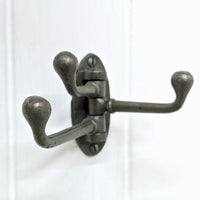 Metal iron triple hook on a white background