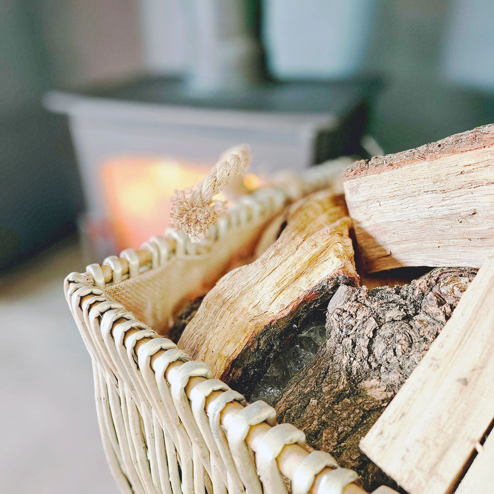 Close up of hessian lined log basket