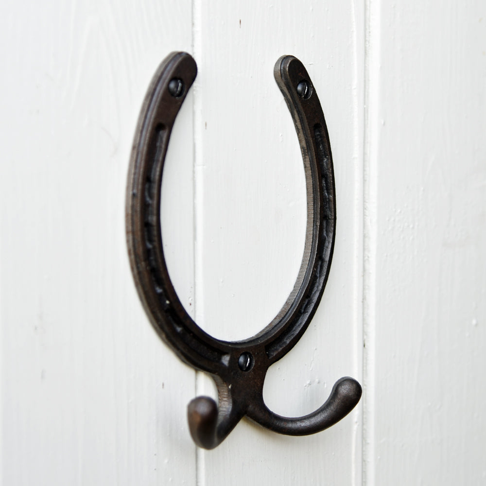 Large cast metal horseshoe shaped wall hook