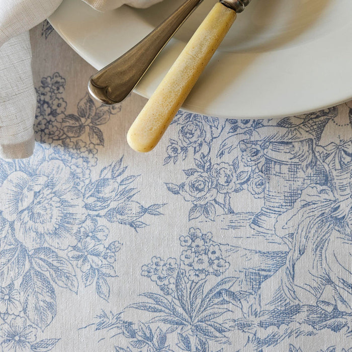 Close up of blue toile de jouy wipe clean tablecloth