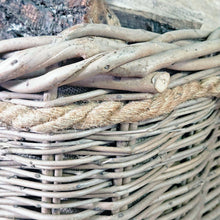 Close up of wild willow woven into the mill wicker log basket with hessian rope trim.