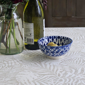 Monstera oilcloth tablecloth covering a table for lunch