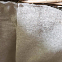 Close up of Morpeth log basket lining.