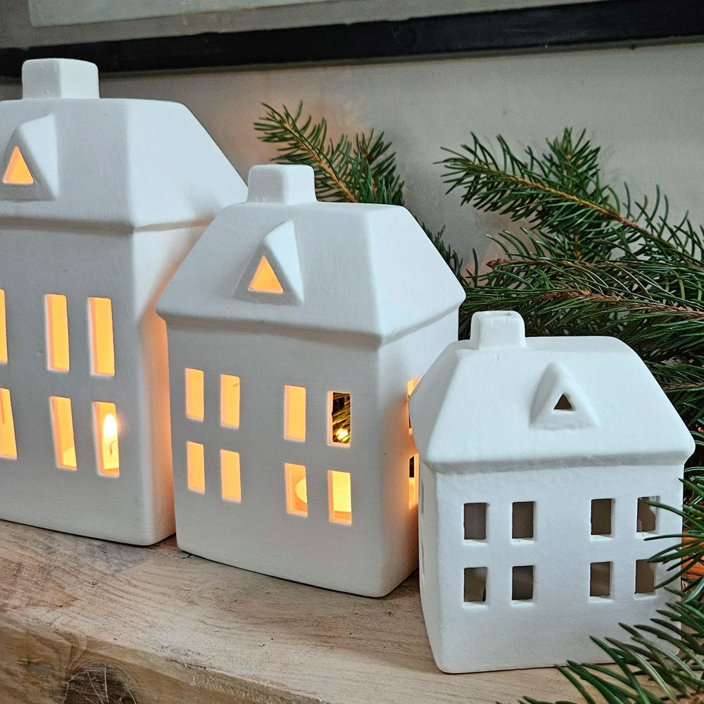 Close up of Christmas candle houses