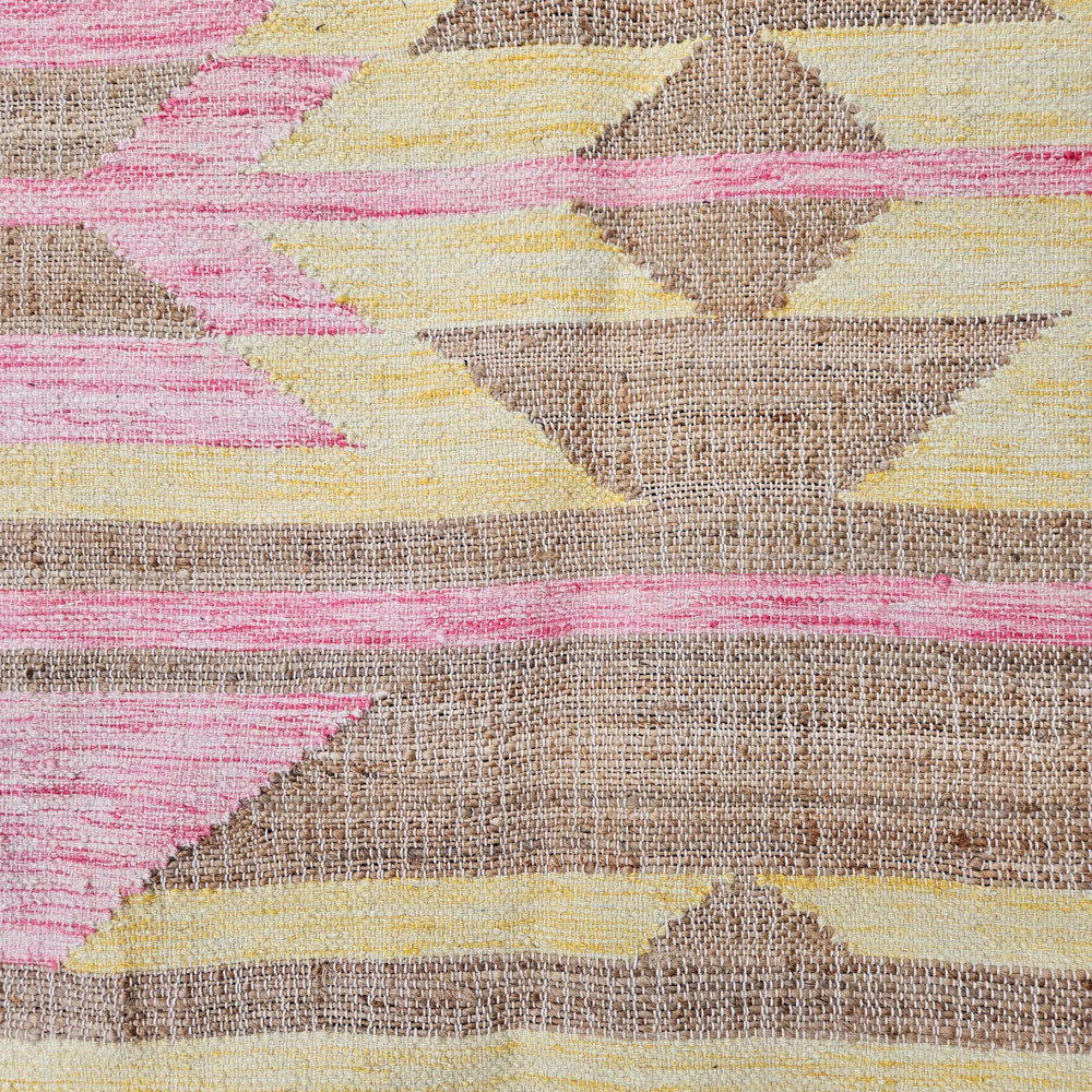 Pink kilim rug close up