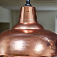 Close up of polished copper 360 mm pendant shade