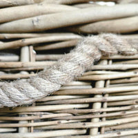 Close up of a ope handle on square log basket