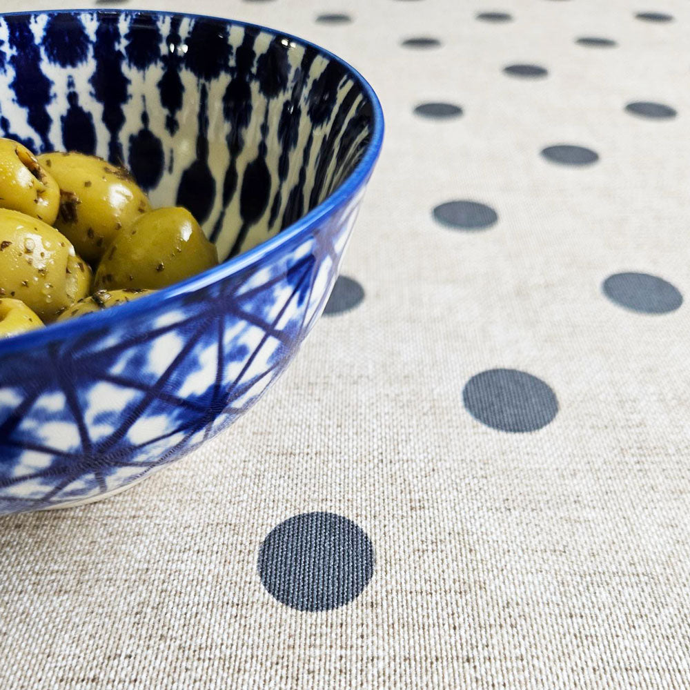 Polka dot oilcloth tablecloth with Ikat bowl