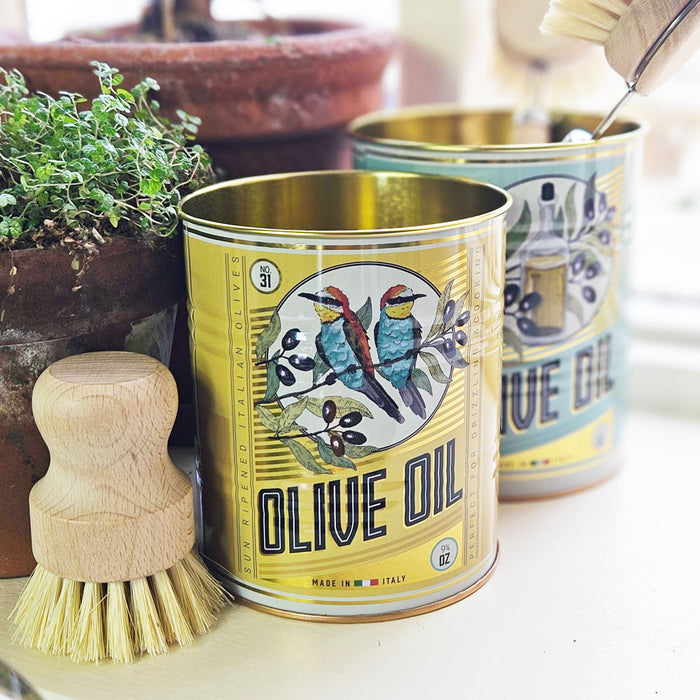 Smaller Olive oil kitchen storage tin on a kitchen windowsill.