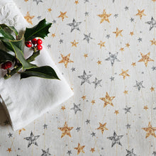 Gold and silver stars patterned tablecloth