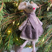 Willa Felt Mouse Christmas decoration surrounded by Christmas foliage.