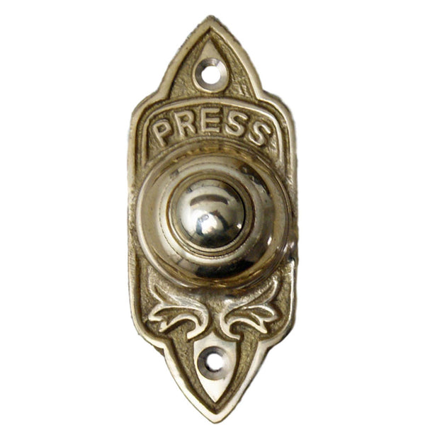 Cut out image of a traditional brass door bell