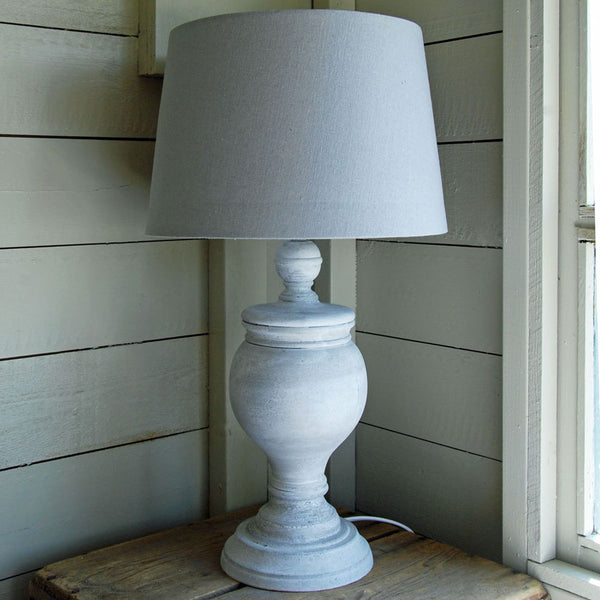 Grey wooden table lamp with grey linen drum lampshade