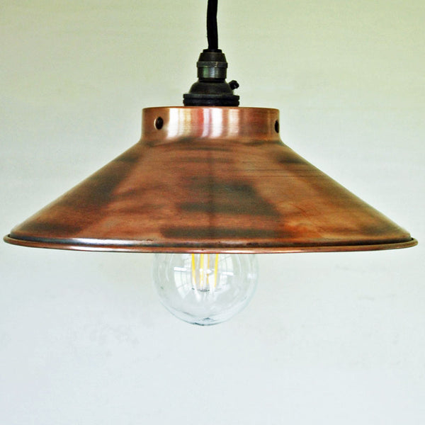 Copper coolie pendant light fitting with large light bulb