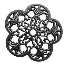 Cast iron flower shaped trivet