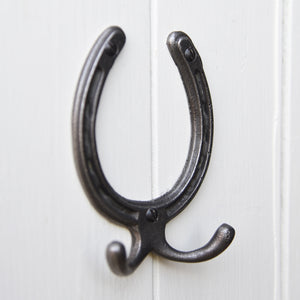 Cast metal horseshoe shaped wall hook