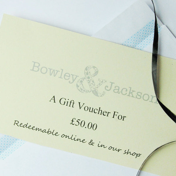 Gift voucher for £50.00 from Bowley & Jackson with a decorative ribbon.