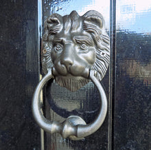 Classic black cast metal lion door knocker