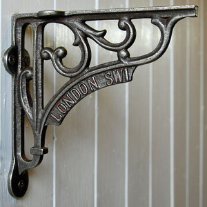 Cast metal antique London SW1 wall shelf bracket