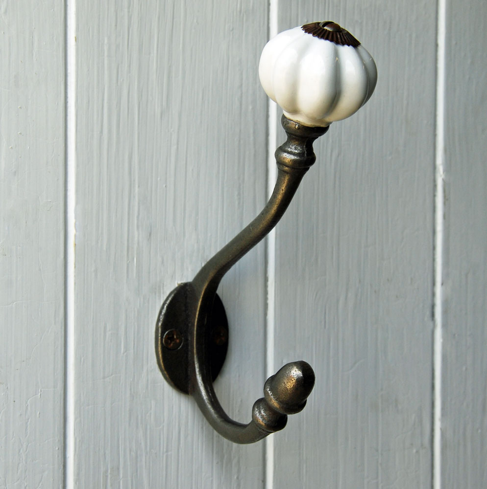 Newby cast metal coat hook with white ceramic tip