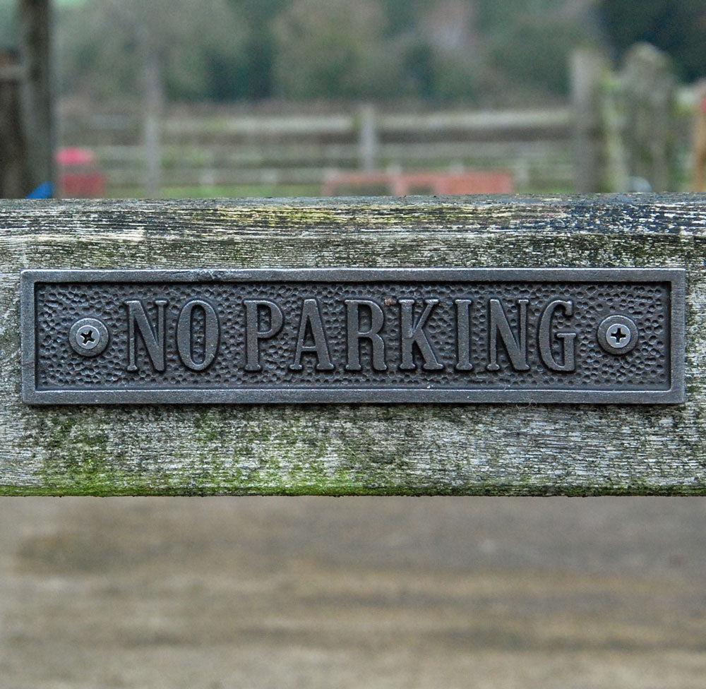 Traditional cast metal no parking gate sign