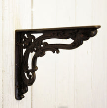 Victorian antique style floral iron shelf bracket.